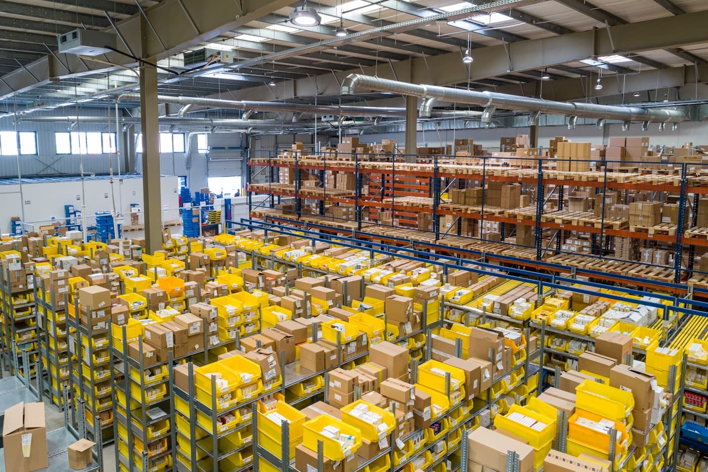 Warehouse team staging palletized inventory for GTA distribution and cross-border transfer