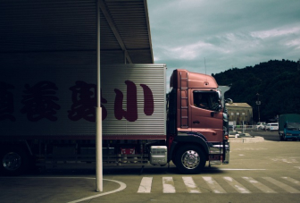 Image of a truck promoting Newl third party warehousing and distribution & ocean freight services.